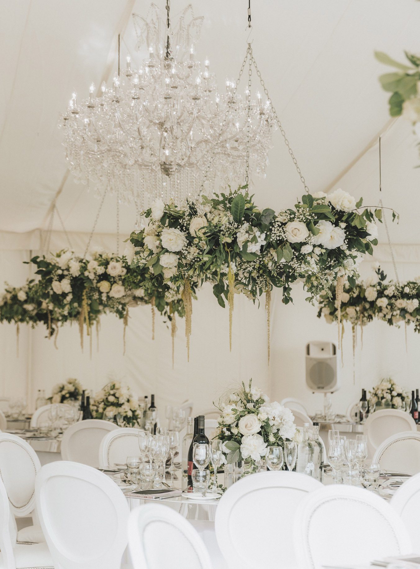 wedding flowers hanging in a marquee from go.botanica florists Sussex